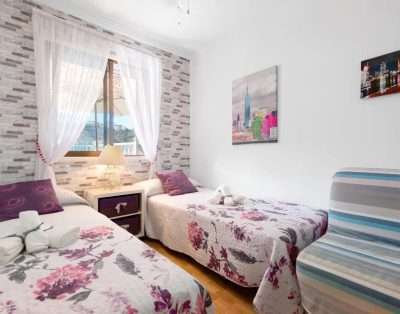 Apartamento vacacional «Jolly Suite Puertorico Beach» con piscina compartida y 2 terrazas privadas